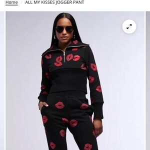 AKIRA Black Joggers with Red Lip Print